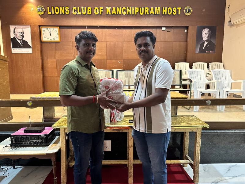 Donated supplies being handed over at Lions Club of Kanchipuram Host in Kanchipuram, India