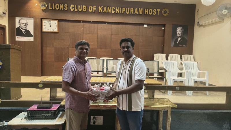 The donation being handed over inside the Lions Club of Kanchipuram Host hall